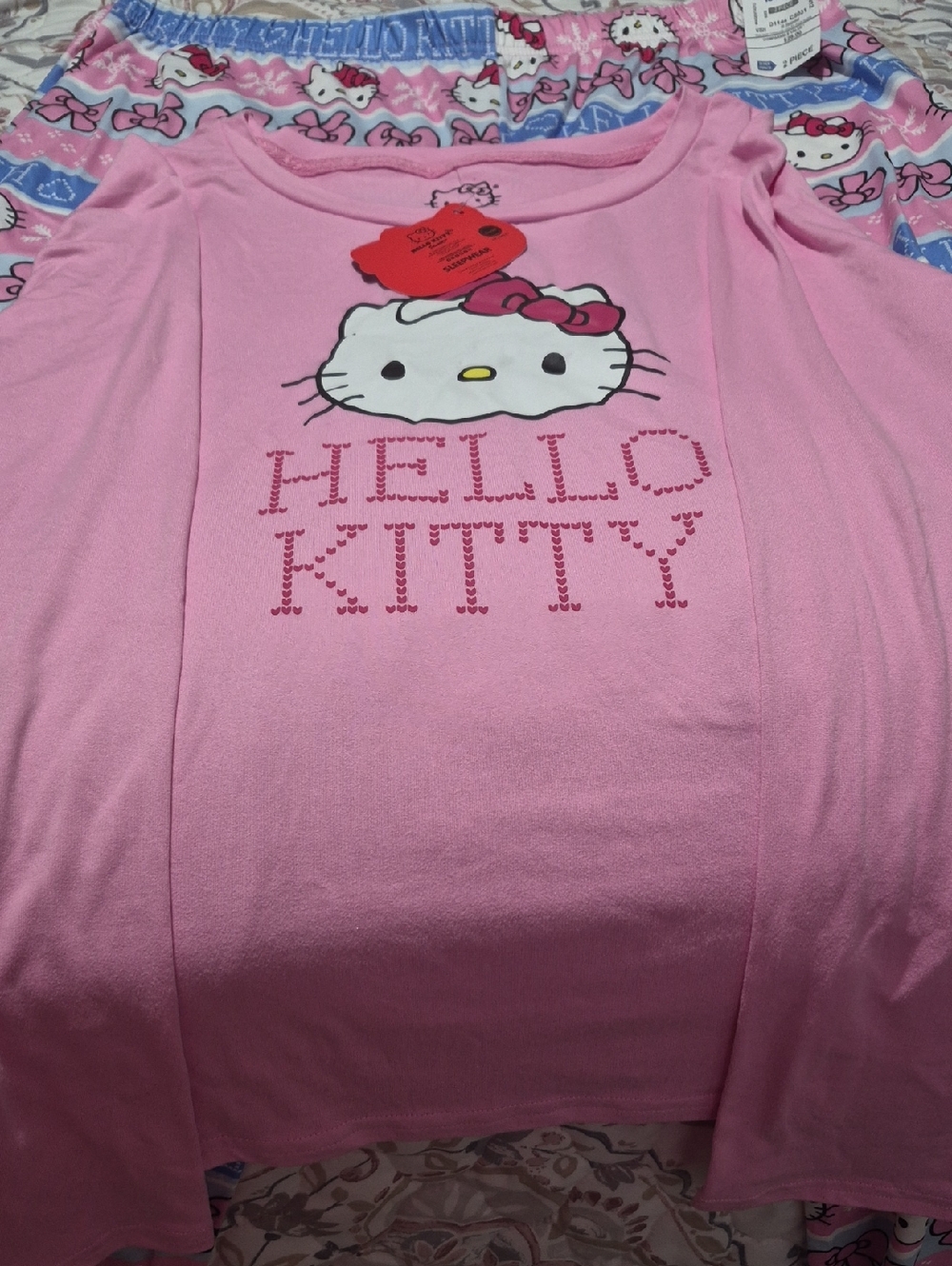 Hello Kitty Light Pink Graphic Top with Bow Accent And Pajama Bottoms Set